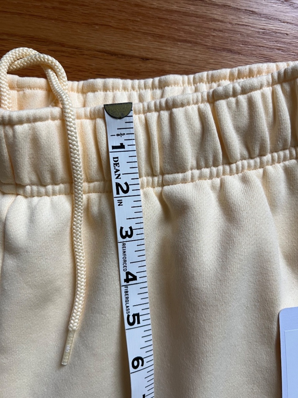 ALO Yoga Candlelight Yellow High-Rise Athletic Shorts with Drawstring - Picture 10 of 15